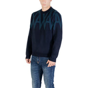 Armani Exchange blue print wool blend knit sweater in dark navy with bold teal geometric pattern across chest and shoulders