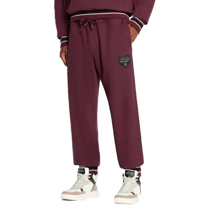 Men’s burgundy Armani Exchange cotton trousers with drawstring waist and ribbed cuffs