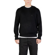 Black crewneck sweatshirt with white trim and logo on chest.