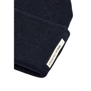 Armani Exchange cap for men in dark navy blue ribbed knit with white label on folded cuff, front view