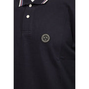 Armani Exchange cotton polo for men in dark navy blue with circular logo patch and striped collar trim front view
