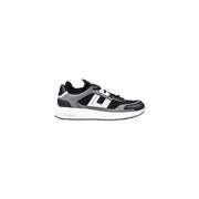 Black and white sneaker with a chunky sole, likely made of leather or synthetic material.