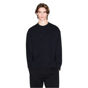 Armani exchange Sweat-shirt oversize en coton noir pour homme, col rond, avec poche avant discrète et coupe décontractée.