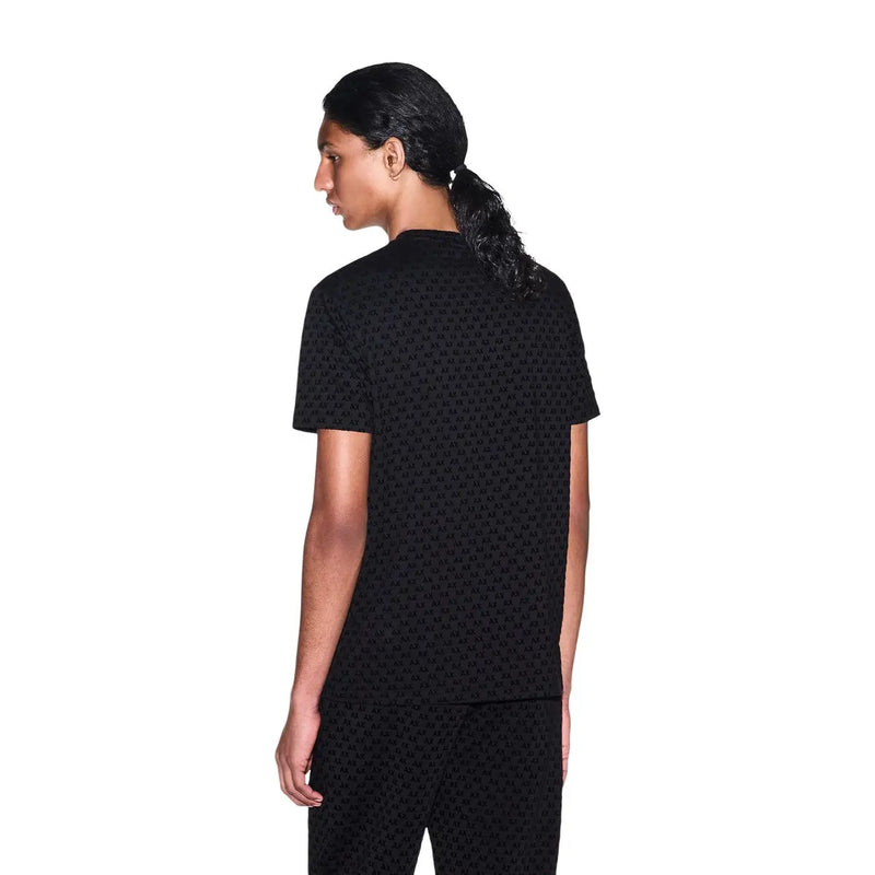 Armani Exchange men black cotton t shirt with subtle repeating pattern on fabric and short sleeves