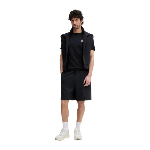 Armani Exchange men black cotton sleeveless blazer with structured collar and subtle logo patch on the chest