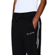 Armani Exchange men black polyester blend track pants with white side stripes and embroidered logo on thigh