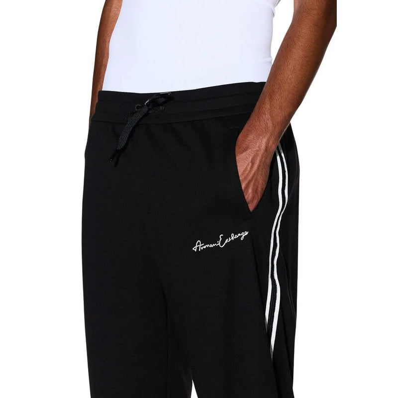Armani Exchange men black polyester blend track pants with white side stripes and embroidered logo on thigh