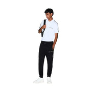 Armani Exchange men black polyester blend jogger pants with white side stripes and embroidered logo on left thigh