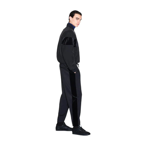Armani Exchange Pantalon de survêtement noir pour homme en polyester modal avec empiècements en velours sur les manches et les côtés