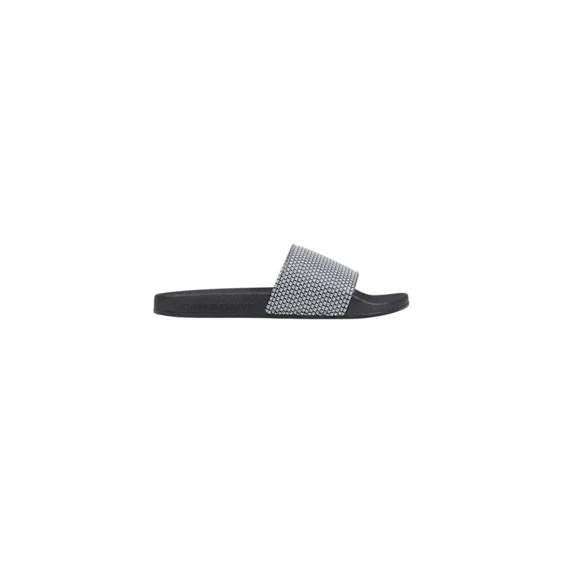 Armani Exchange men black slide sandal with a textured silver-toned PVC strap featuring an intricate geometric pattern