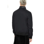 Armani Exchange Blouson aviateur noir en polyamide pour homme, avec de discrètes finitions blanches au niveau du col et fermeture éclair.