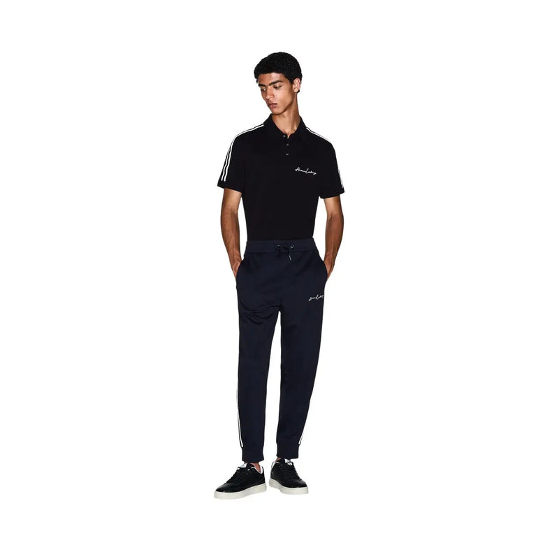 Black polo shirt with white sleeve stripes and embroidered logo paired with Armani Exchange men blue poly blend trousers