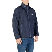 Armani exchange men blue zip blazer is a navy lightweight polyester jacket with white zipper trim and logo patch on chest
