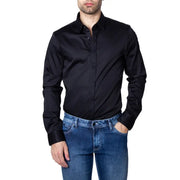 Black long-sleeved men’s dress shirt by Armani Exchange with subtle chest logo ideal for formal occasions