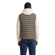 Armani Exchange men down waistcoat brown sleeveless quilted puffer vest with hood worn over cream hoodie