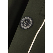 Armani Exchange Grüne Herren-Jogginghose aus Baumwolle mit dunkelolivgrünem Besatz und rundem, schwarz-weißem Axt-Logo-Aufnäher