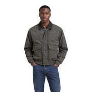 Armani Exchange Grüner Herrenblazer aus Polyester im olivgrünen Steppjackenstil mit dunklem Kragen und aufgesetzten Vordertaschen.