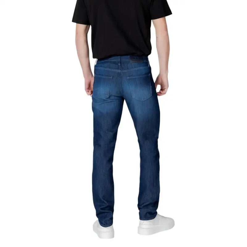 bleu foncé Armani Exchange Jean homme coupe slim avec délavage subtil aux cuisses, en coton stretch