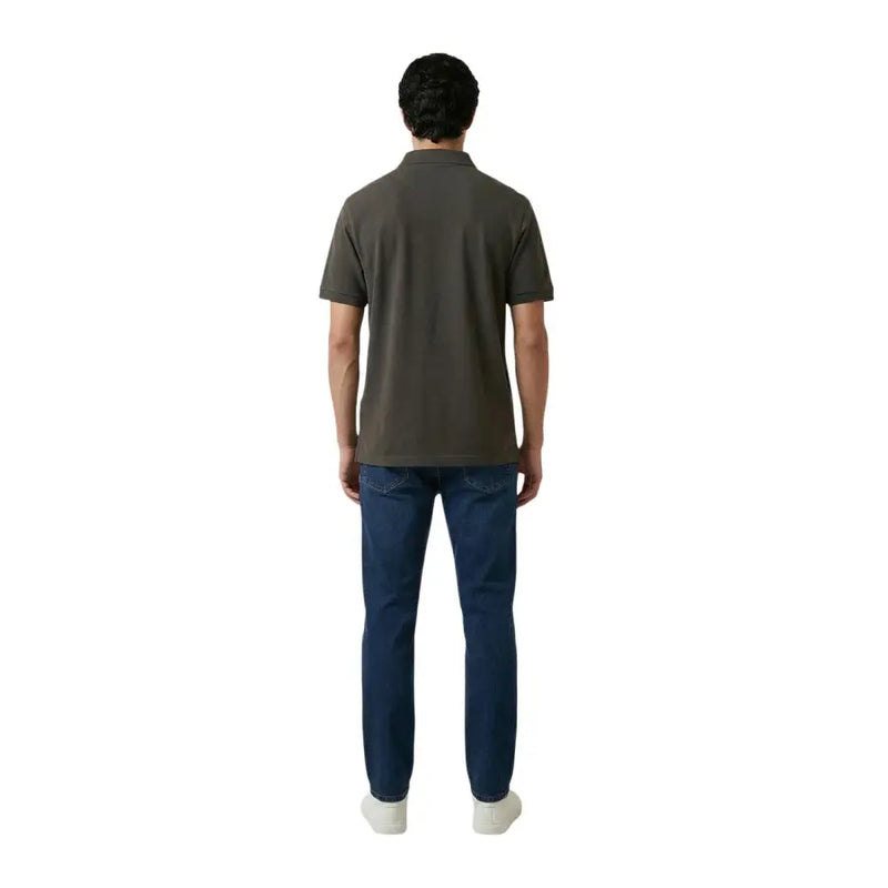 A man wearing an Armani Exchange men polo brown short sleeve cotton elastane shirt with classic collar and stitched seams