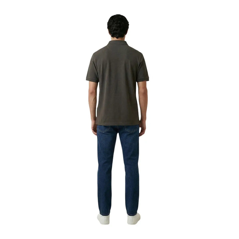 A man wearing an Armani Exchange men polo brown short sleeve cotton elastane shirt with classic collar and stitched seams