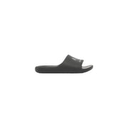 Black calvin klein slide sandal with minimalist design and subtle white logo on strap for men rubber slippers