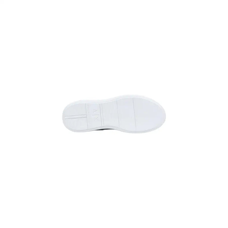 White rubber sole with minimalist design and subtle embossed branding on armani exchange men sneakers white leather sport slip