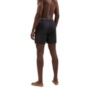 Armani Exchange men swimwear black swim trunks with subtle contrasting geometric pattern for beachwear