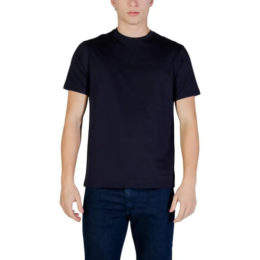 Armani Exchange men black crew-neck t-shirt with subtle embossed branding across the chest in cotton material