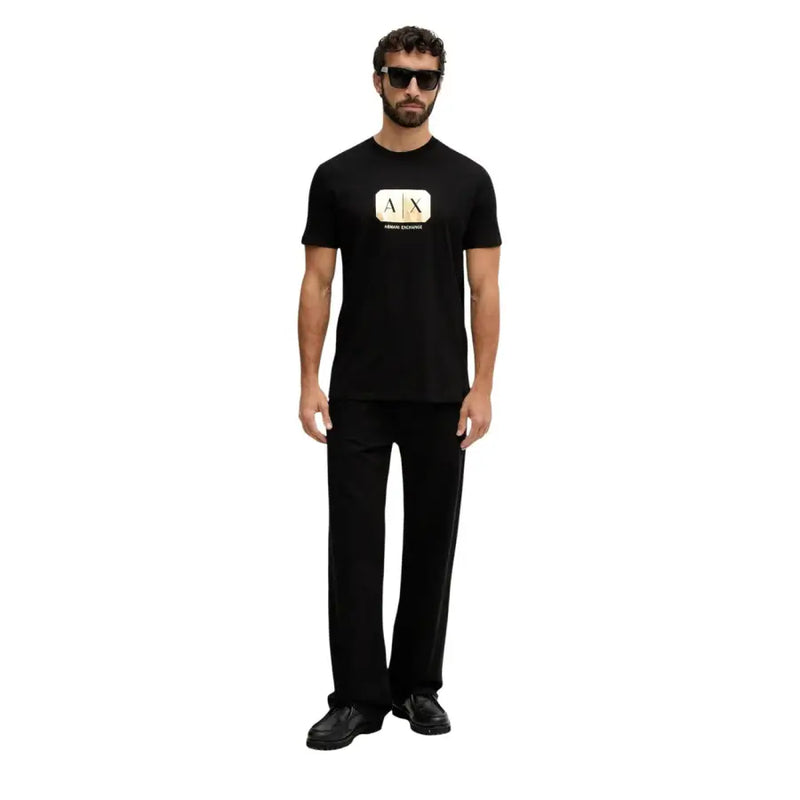 Black Armani Exchange men t-shirt featuring a gold and white logo on the chest, ideal for casual wear