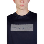 Black cotton Armani Exchange men t-shirt with rectangular graphic featuring diagonal white stripes and gray logo