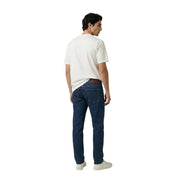 Dark blue denim jeans with classic five-pocket design and brown leather belt loop paired with armani exchange men t shirt