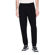 Armani Exchange men trousers black cotton joggers with drawstring waistband and subtle logo on the thigh