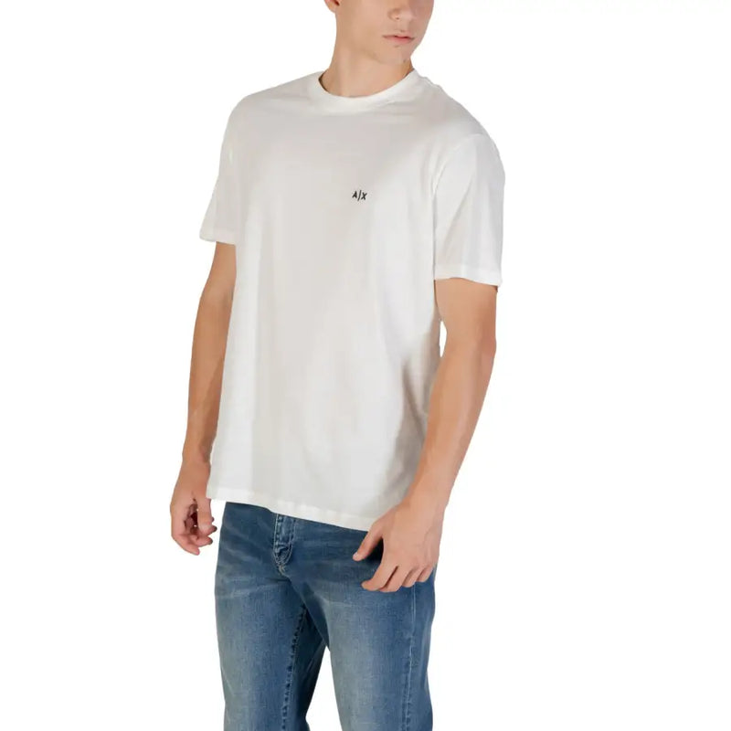 Men’s white cotton short-sleeve round neck T-shirt paired with blue jeans
