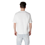Men’s white cotton crew-neck t-shirt paired with light-wash blue jeans