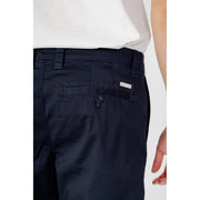 Armani Exchange men’s blue cotton blend shorts back side showing dark navy chino pants texture and branded tag