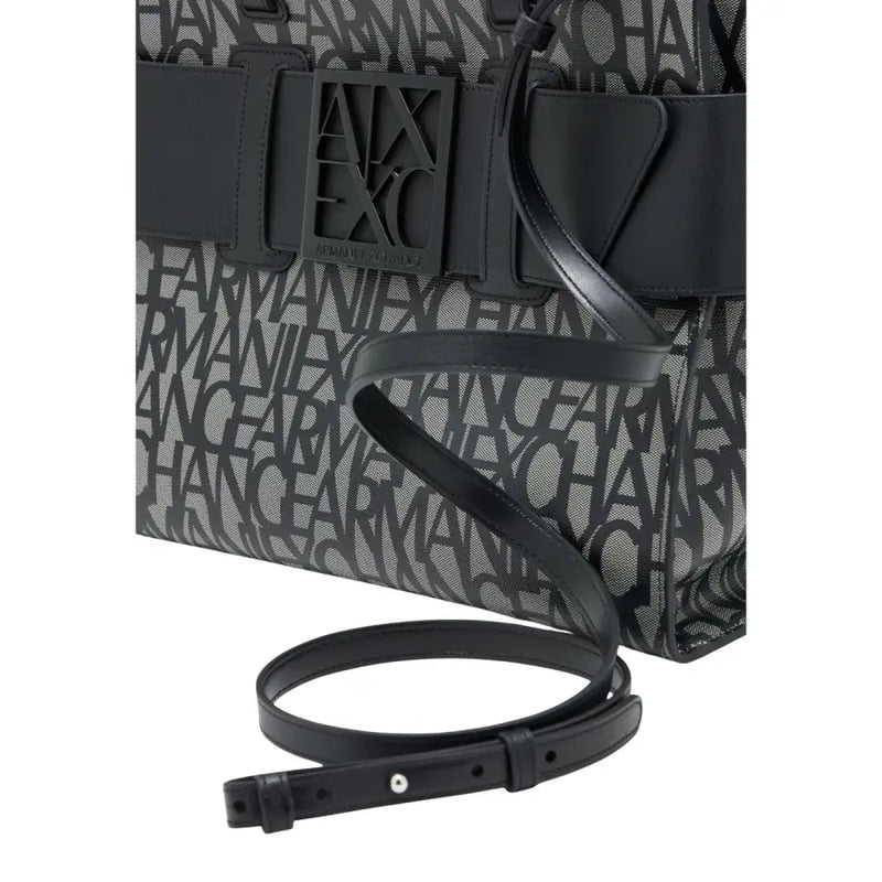Black Armani Exchange tote bag with repeating monogram pattern and leather straps in black and gray