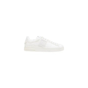 White leather low-top sneaker with lace-up design and chunky sole.