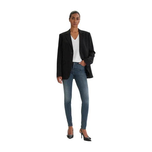 Schwarzer Blazer mit strukturierter Passform und einreihigem Design, kombiniert mit armani exchange blaue Stretch-Jeans für Damen