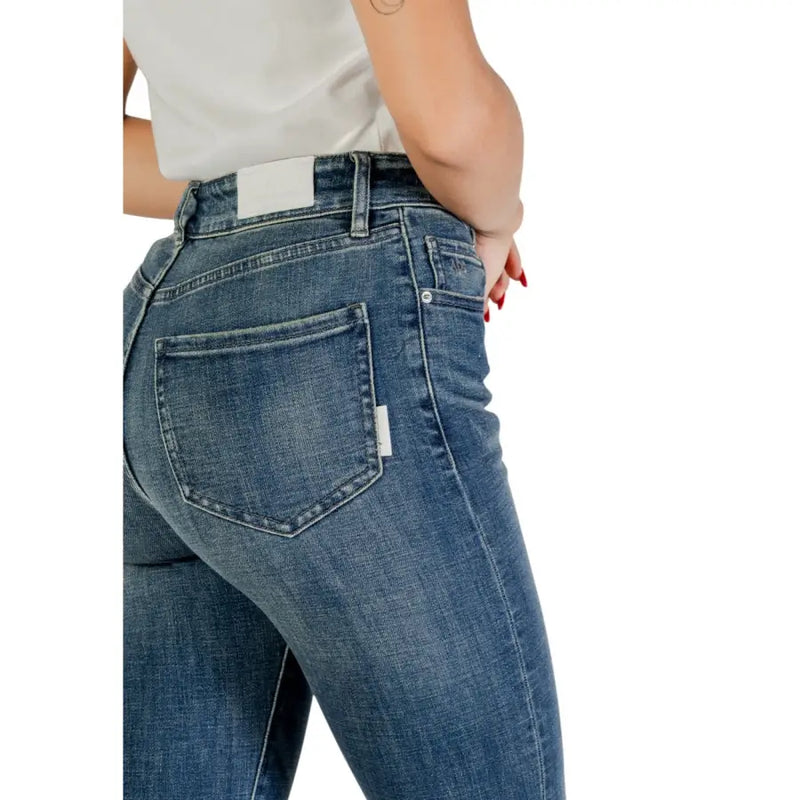 Armani exchange women blue denim jeans with zip button, classic five-pocket design, white stitching, and worn out effect