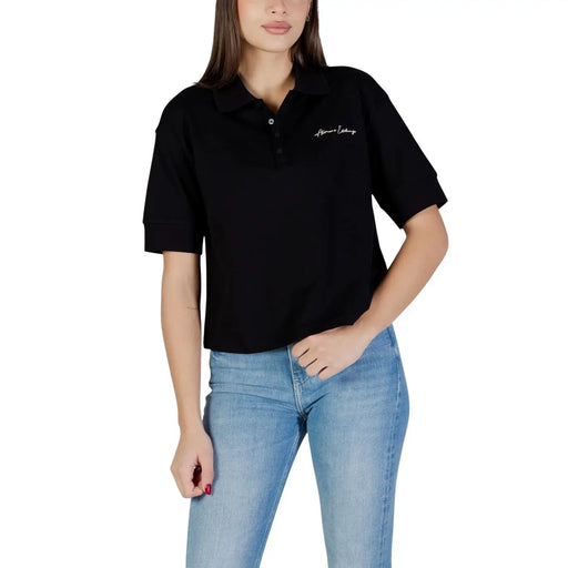 Armani Exchange Schwarzes, kurzärmeliges Damen-Poloshirt aus Baumwolle mit dezentem, weißem, gesticktem Logo auf der linken Brustseite.