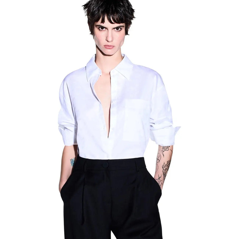 Armani Exchange women white long classic cotton shirt with rolled sleeves and deep v-neckline in minimalist style