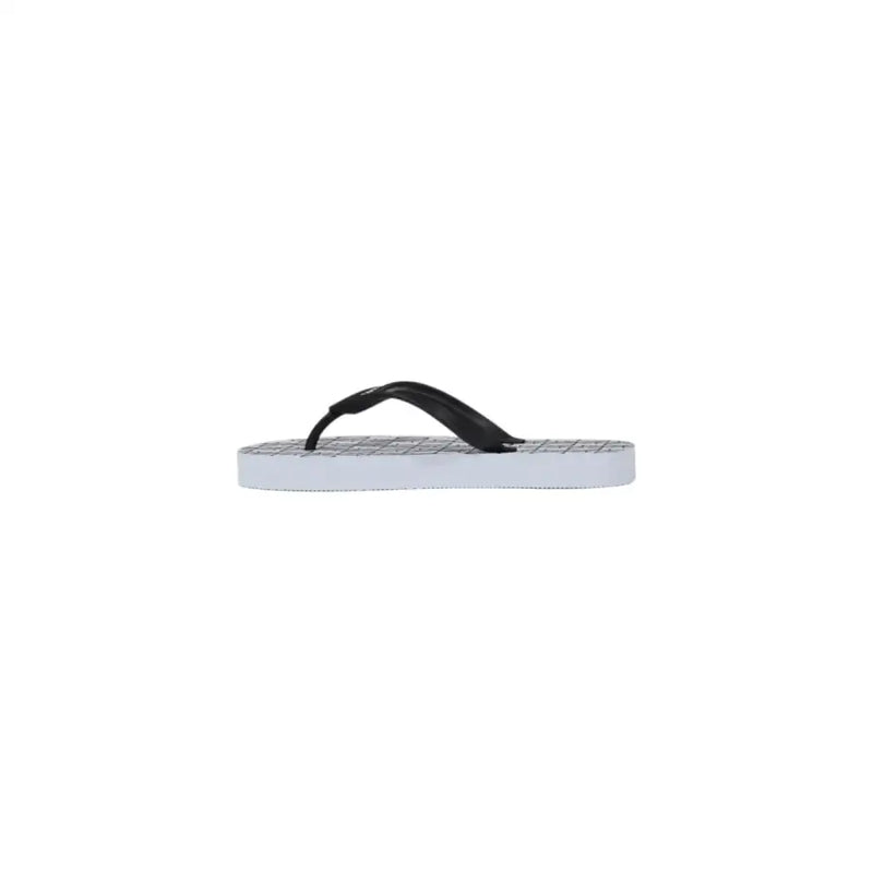 Armani Exchange women white rubber flip-flops featuring black and white grid patterned soles