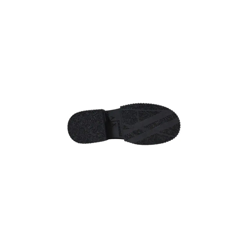 Black rubber sole with textured tread pattern and embossed armani exchange logo on womens leather moccasin slippers