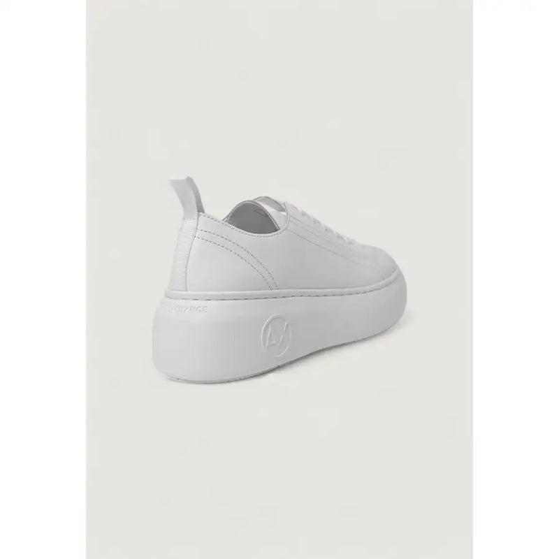 Armani exchange women’s white leather low-top slip-on sneaker with thick platform sole and subtle heel branding back view