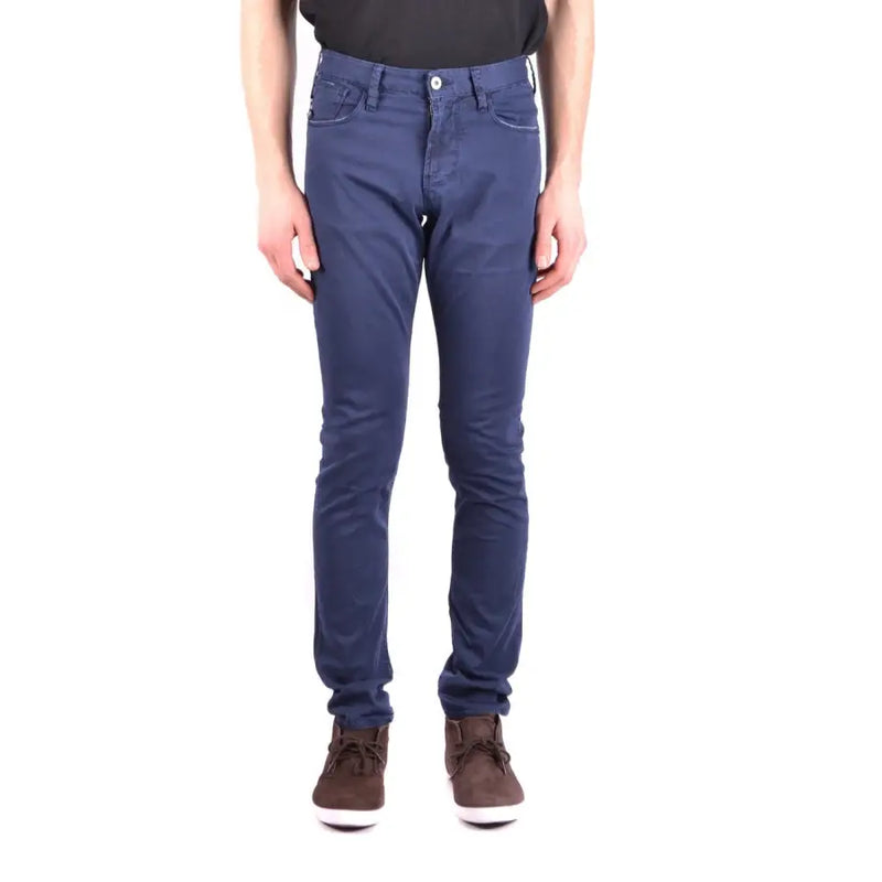 Dark blue slim fit jeans with white stitching and a classic five-pocket design.