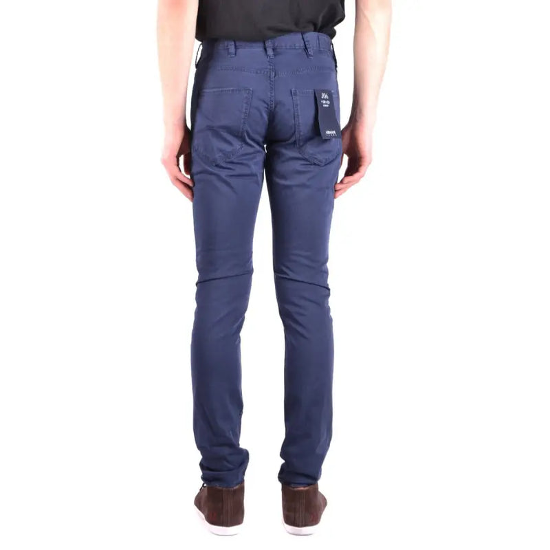 Navy blue slim-fit cargo pants with multiple pockets and a brand label on the back.