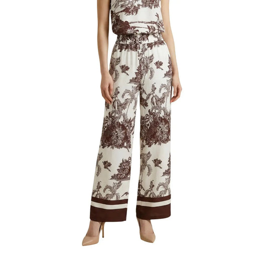 Artigli women beige viscose wide-leg trousers with brown botanical print and matching striped cuffs for spring summer