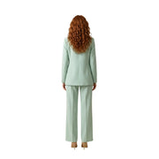 A woman wearing an Artigli women green blazer polyester lapel collar suit with tailored blazer and straight-leg trousers