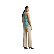 Artigli women sleeveless turtleneck top in green polyester with teal and white abstract pattern and bow at back neckline