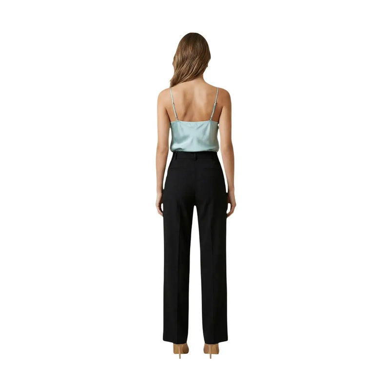 Black high-waisted wide-leg tailored trousers complementing Artigli women top green straps v-neck polyester actp004367